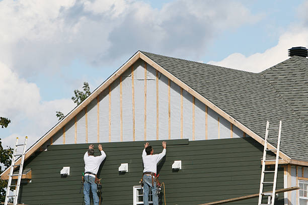 Professional Siding Contractor technician working in Champion, PA